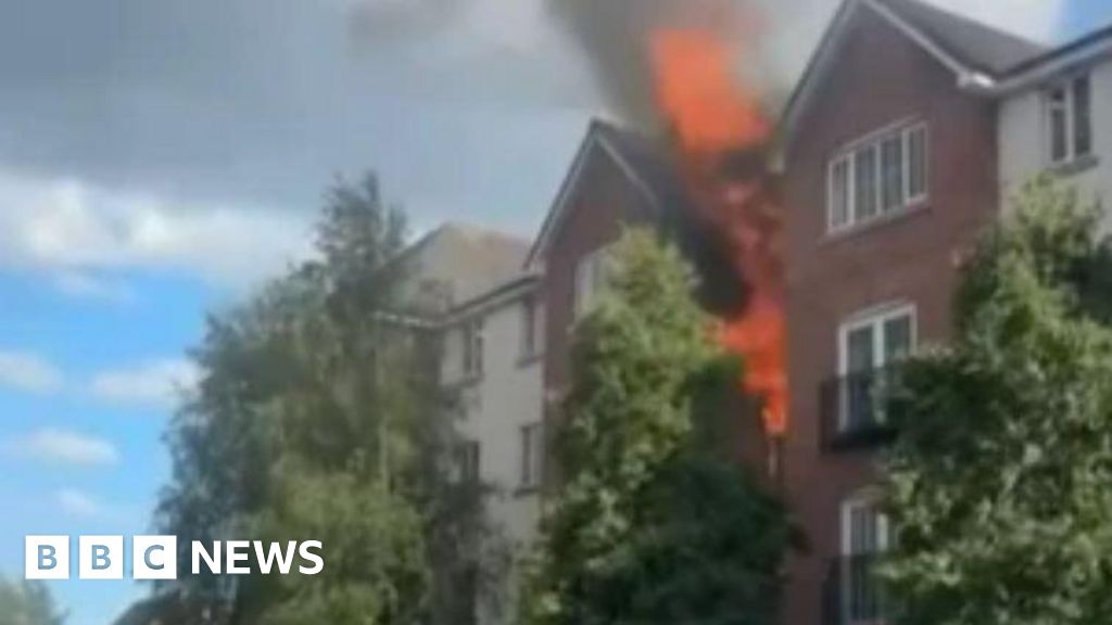 Child, 10, arrested over fire at block of flats