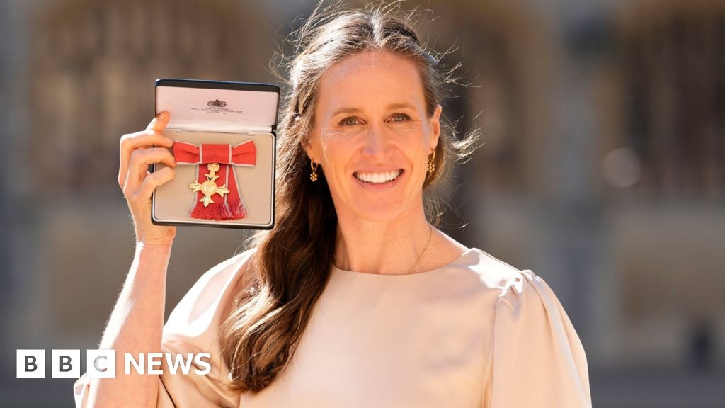 Olympic champion rower Helen Glover collects OBE