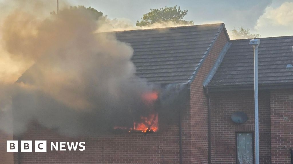 Man treated after fire at Redditch flat