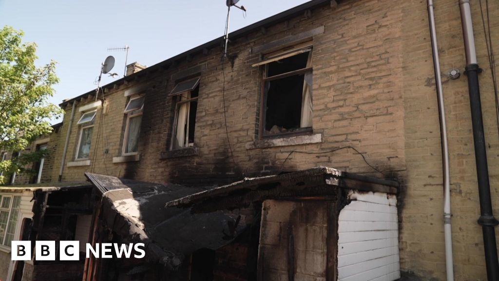 Man held in connection with fatal house fire