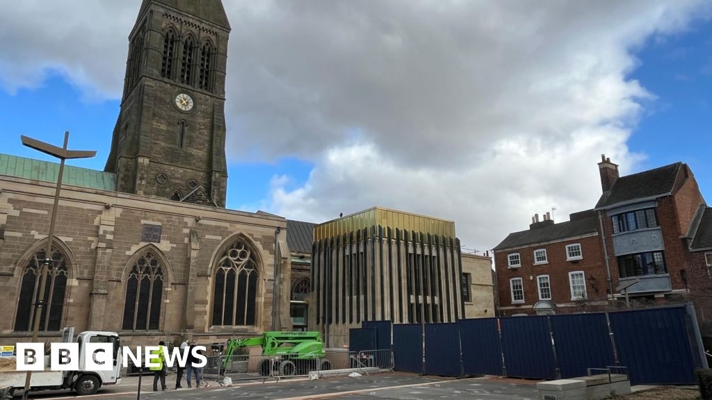 Hoardings come down to reveal Leicester Cathedral extension
