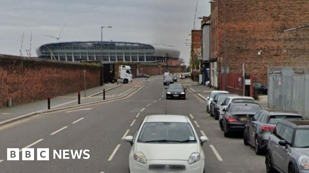 Man arrested after biker dies in crash at busy Liverpool junction