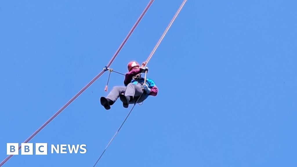 Bishop abseils down Guildford Cathedral for charity