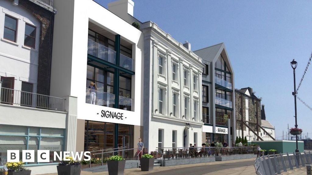 Plans for flats and retail units on Douglas quay backed