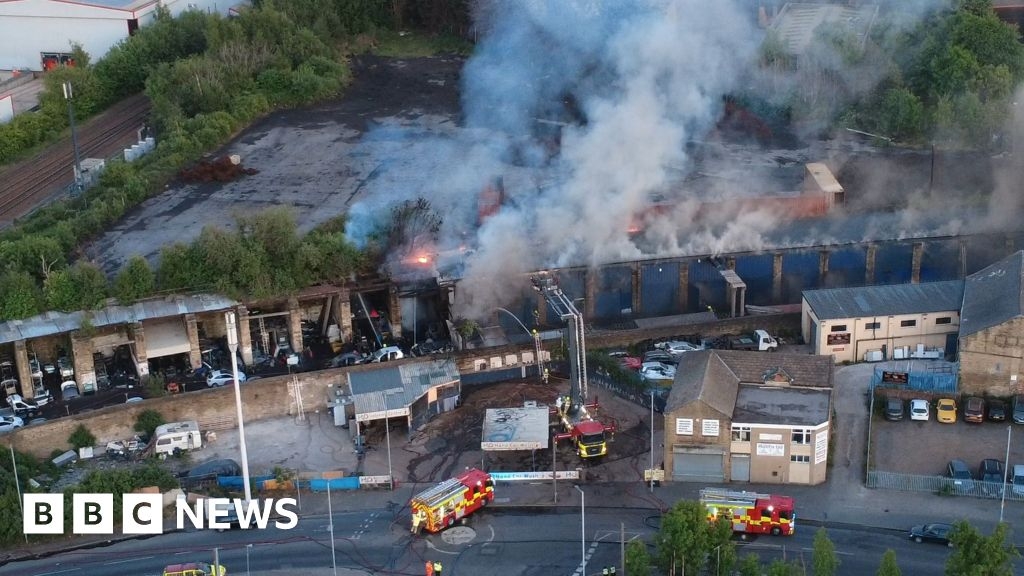 Smoke warning as crews tackle Bradford scrap yard fire