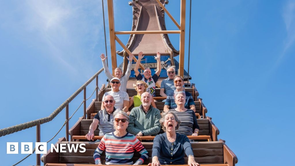 Thrill-seeking over 70s brave the rides for theme park celebration