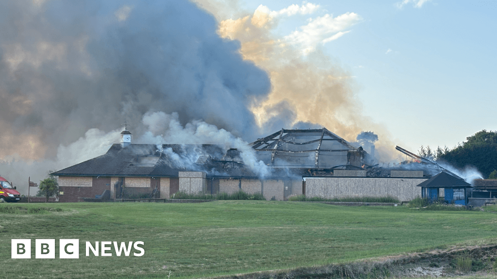 Crews remain at scene of former golf club building fire