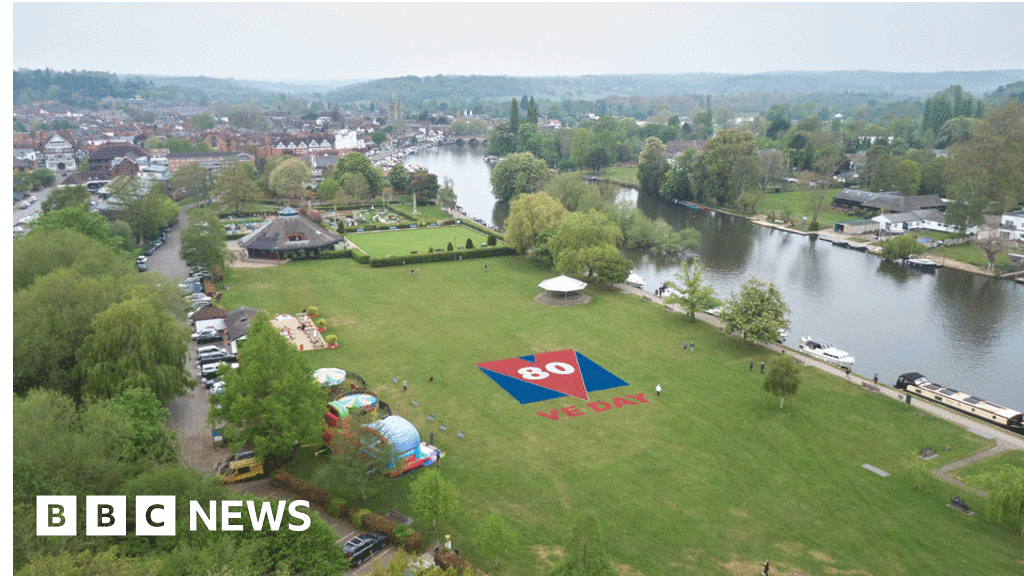 Giant VE Day logo displayed in Henley-on-Thames park