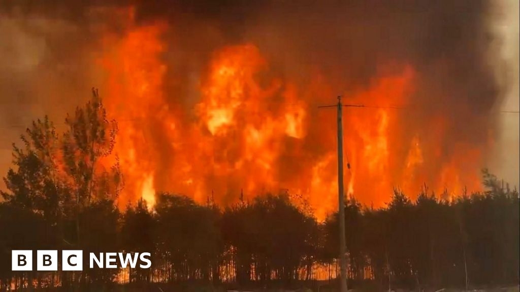 Military aircraft evacuates residents from Canada wildfire