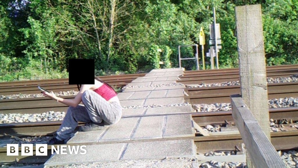 Selfies and stunts prompt Grove level crossing closure