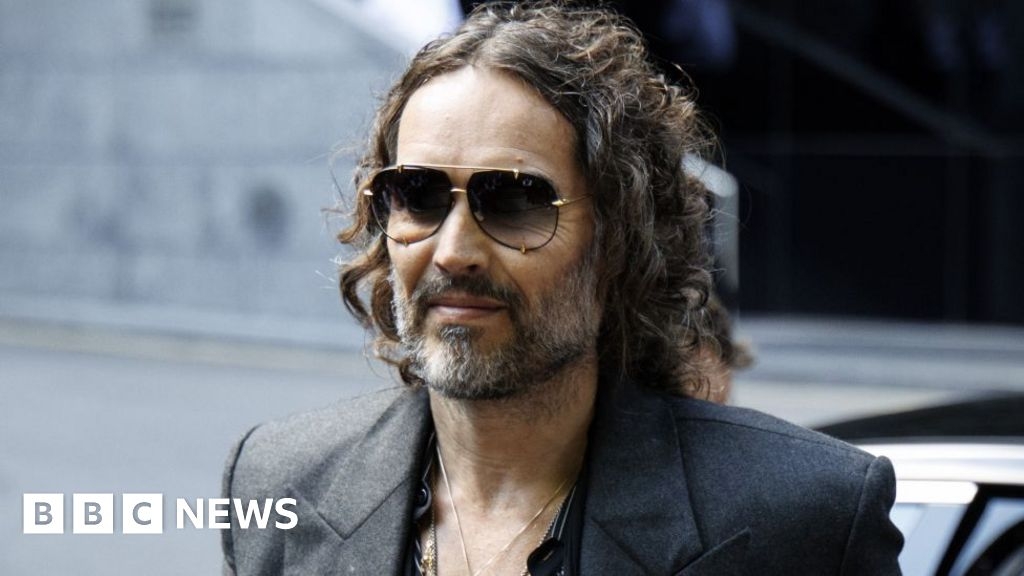 Russell Brand at court to answer rape and assault charges