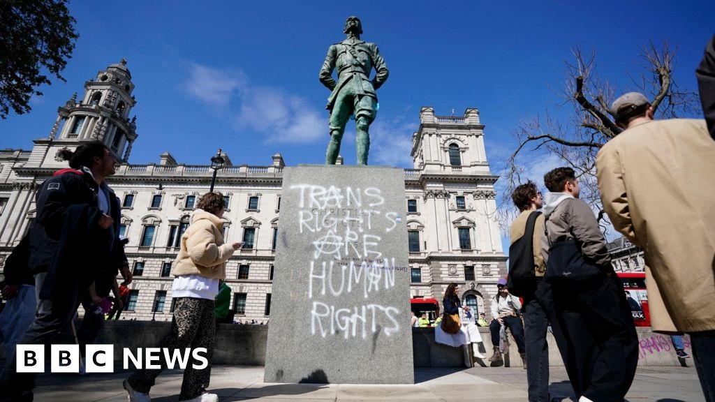 Westminster statues graffitied at London trans protest