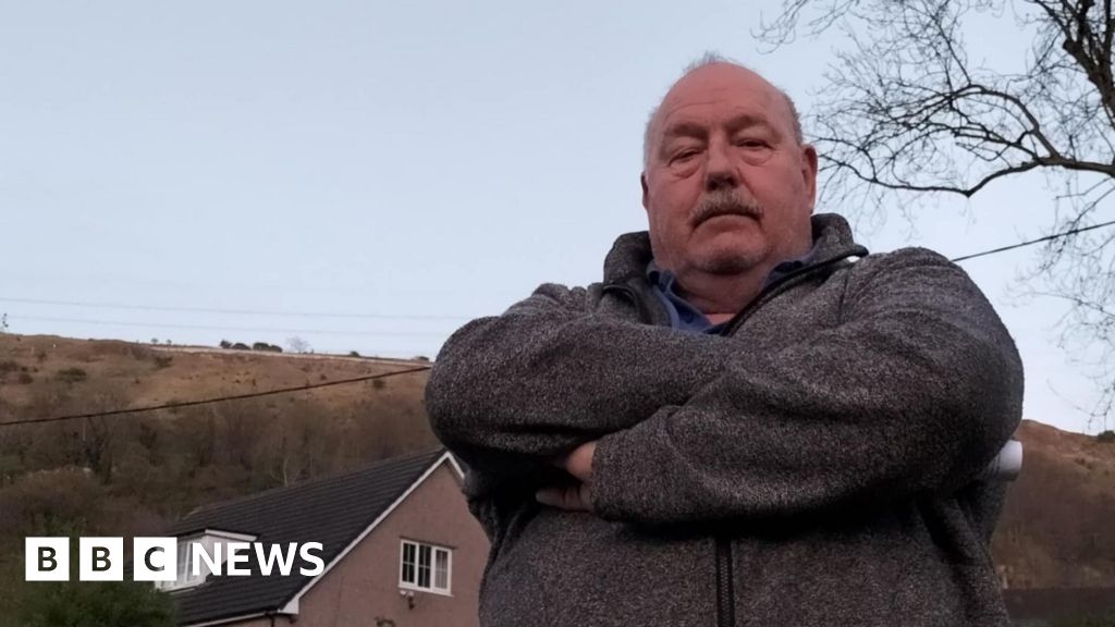 'Disgusting' mountainside fence to be removed after backlash