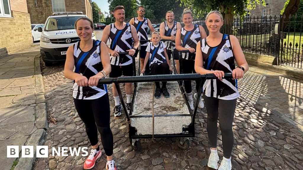 Police team at Knaresborough Bed Race push for fallen colleague