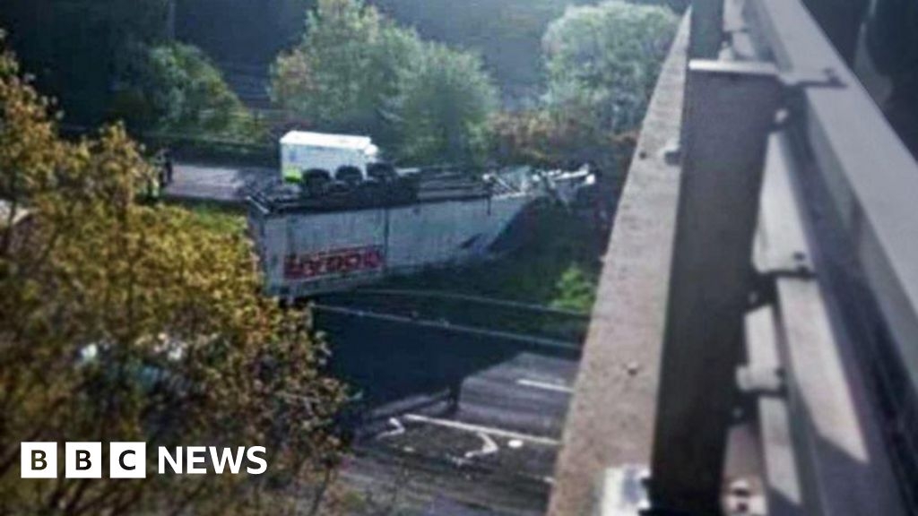 Driver critical after lorry crashes though flyover barrier on M90 near Perth