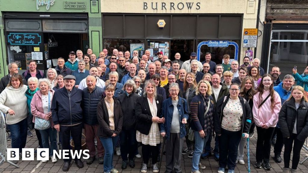 Paper boys and girls reunite at Ely newsagent to mark closure