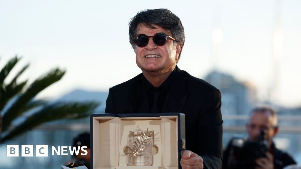 Risking imprisonment, Palme d'Or winner returns home