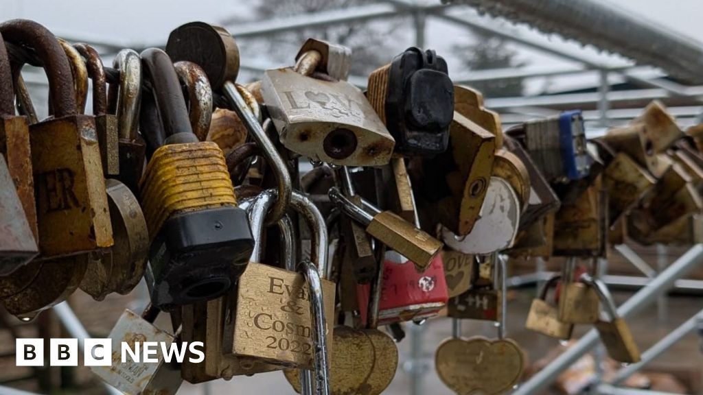 Bakewell love locks strung up at their new home