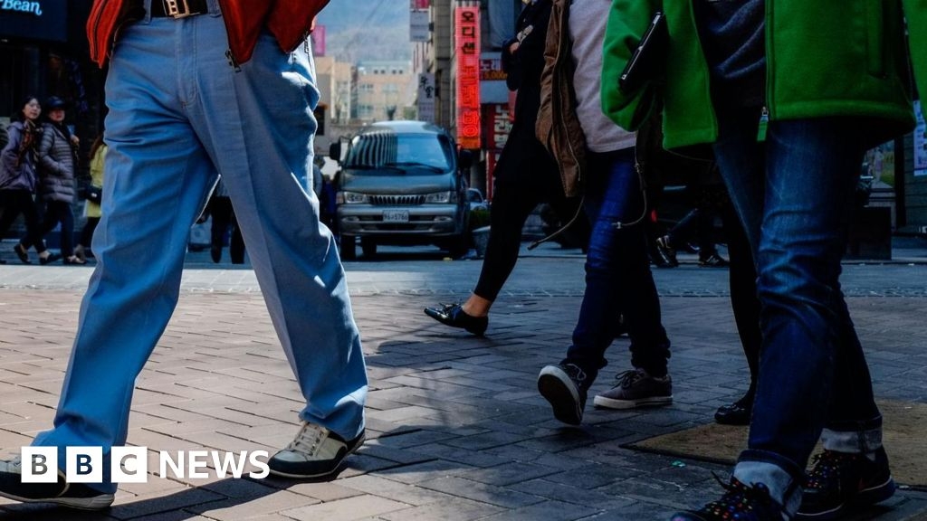 South Korean woman fined for pulling down male colleague's trousers