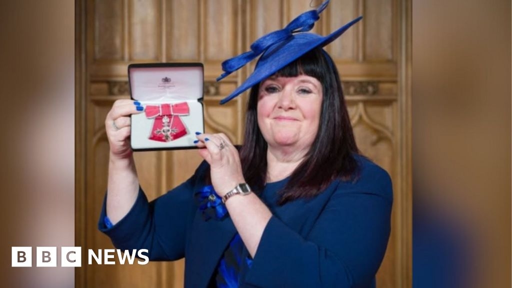 'My proudest day', says Derbyshire solicitor on collecting MBE