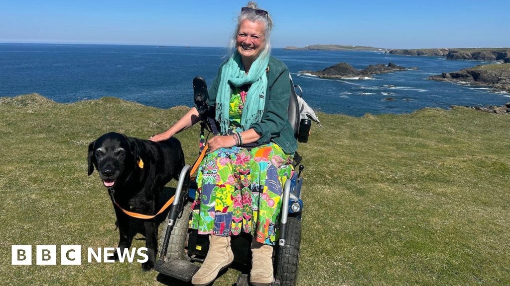 Wheelchair user demonstrates access along South West Coast Path