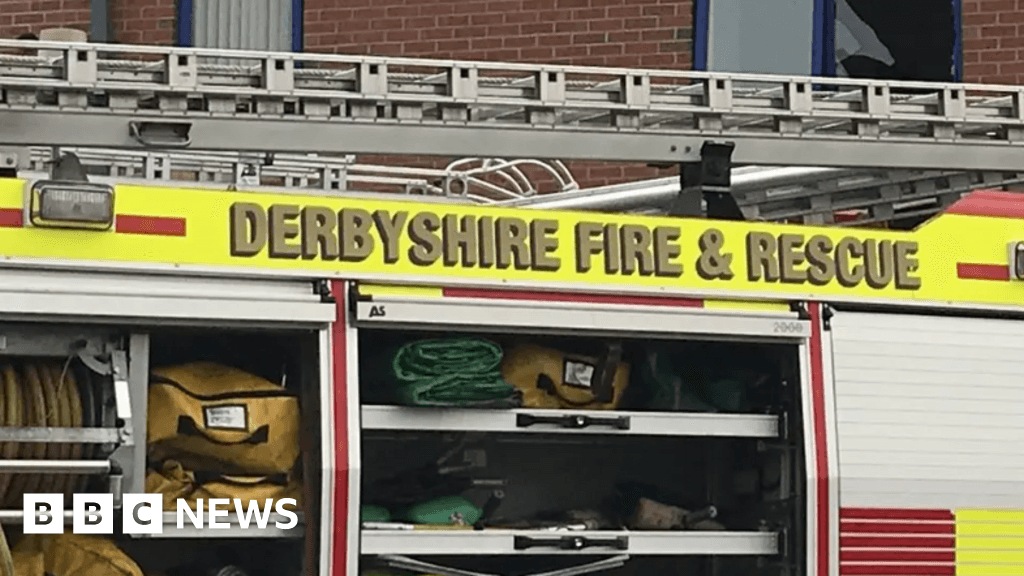Roads closed in Derby as crews tackle building fire