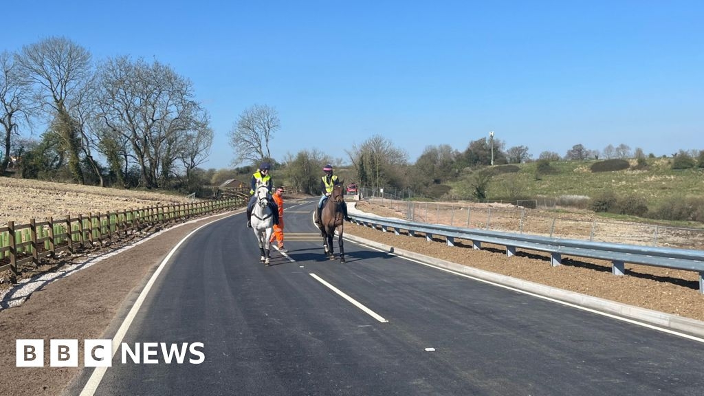 Lyneham Banks: UK's wonkiest road opens after three-year closure