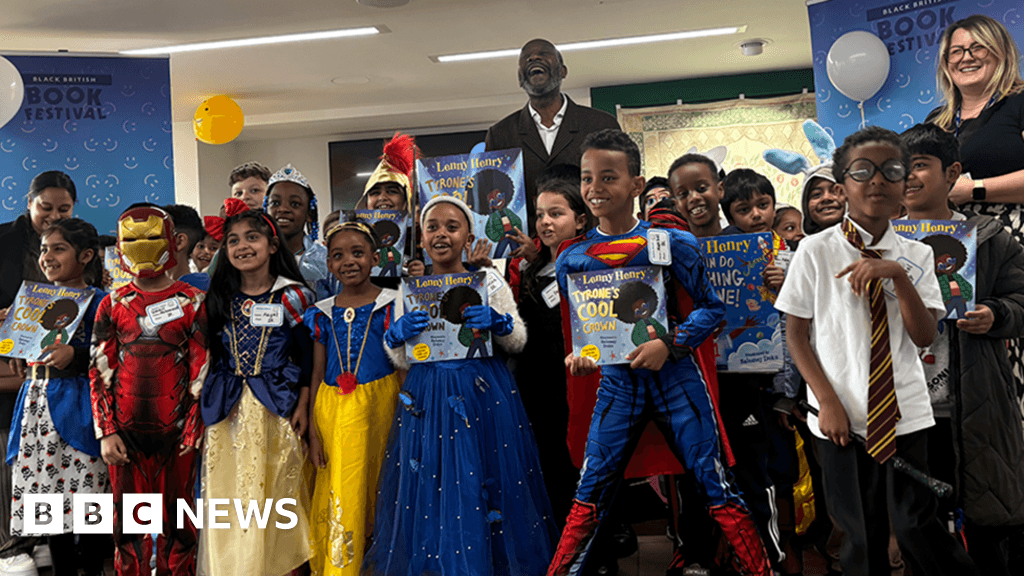Sir Lenny Henry reads to pupils at Birmingham book festival