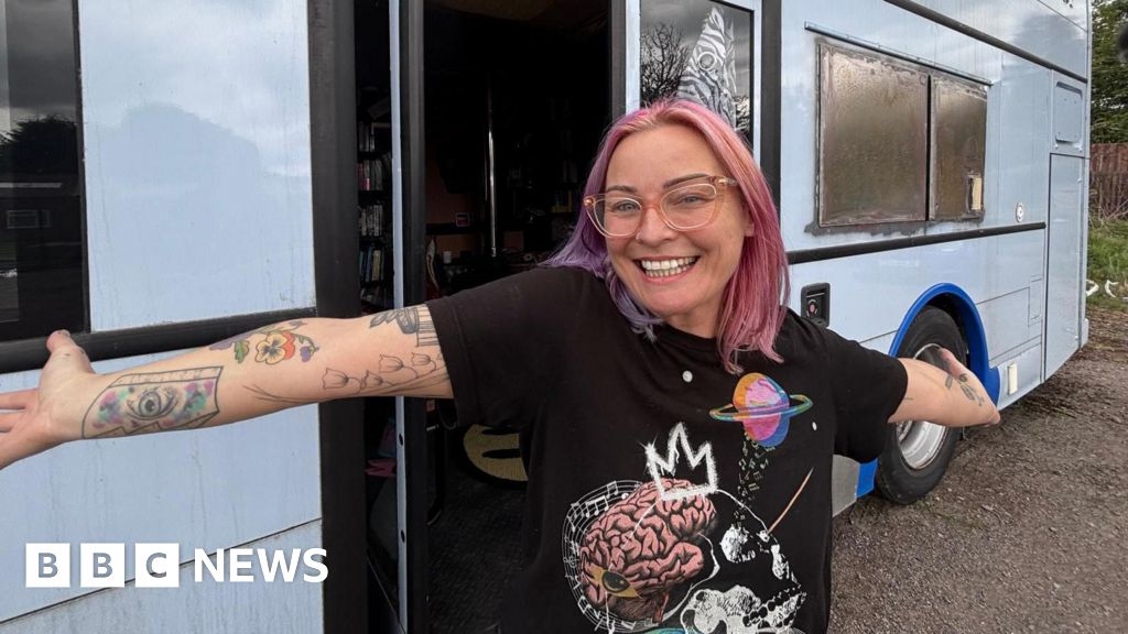 'I live in a double-decker bus that's also a library' Anstey woman says