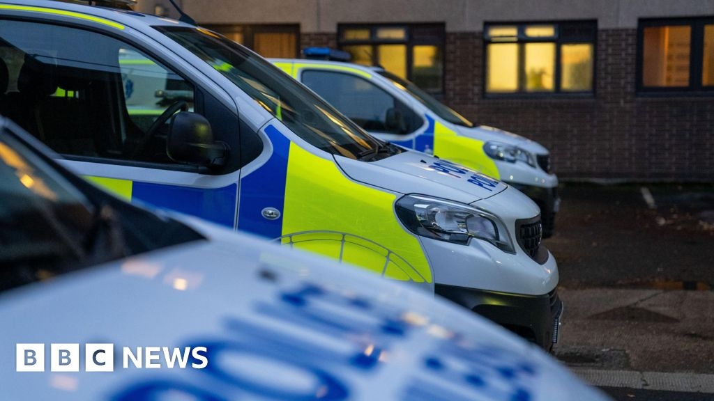 Six men charged following dawn raids in Glasgow
