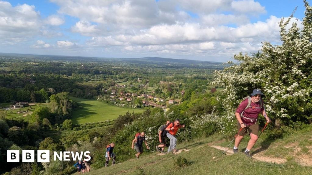 Group of Surrey men hike 11 mountains in a day for charity
