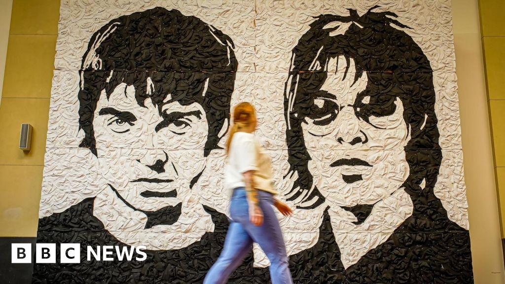 Oasis mural made of bucket hats unveiled in Cardiff