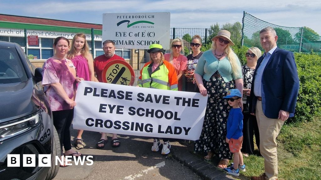 Parents protest over loss of lollipop lady at Peterborough school