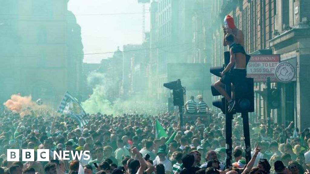 Police arrest 21 people after thousands attend Celtic title party
