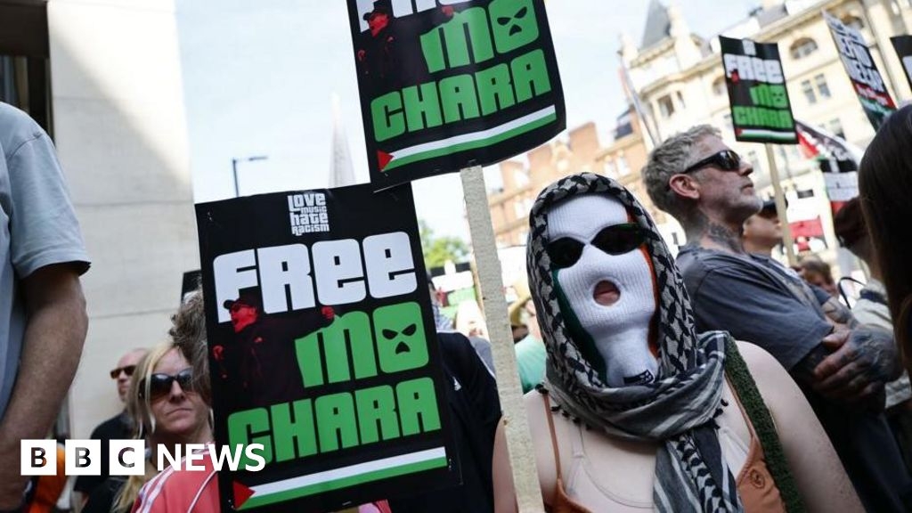 Kneecap: Protests outside court as rapper appears on terror charge