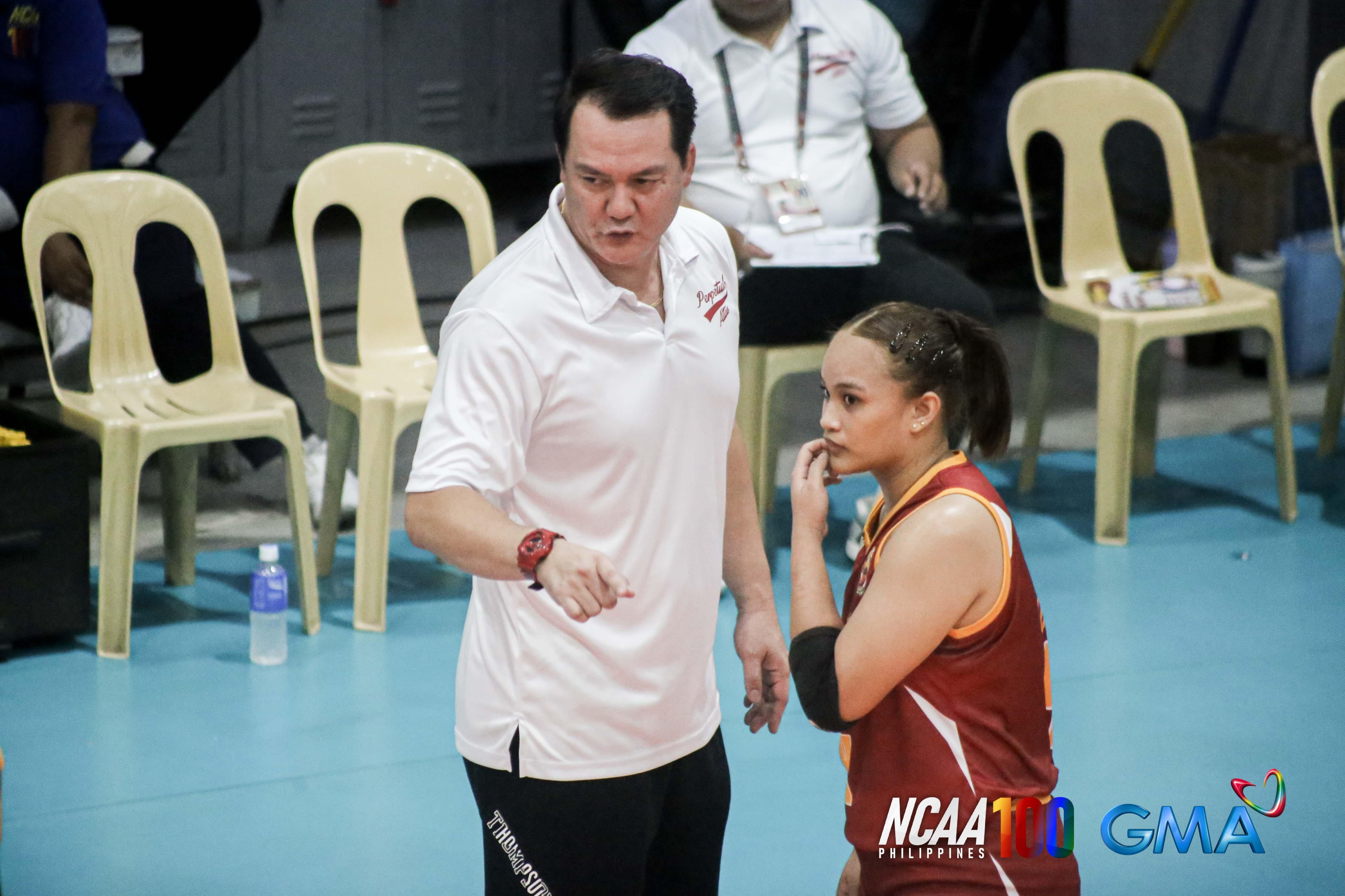 High school volleyball coach Sandy Rieta talks about handling three teams for Perpetual