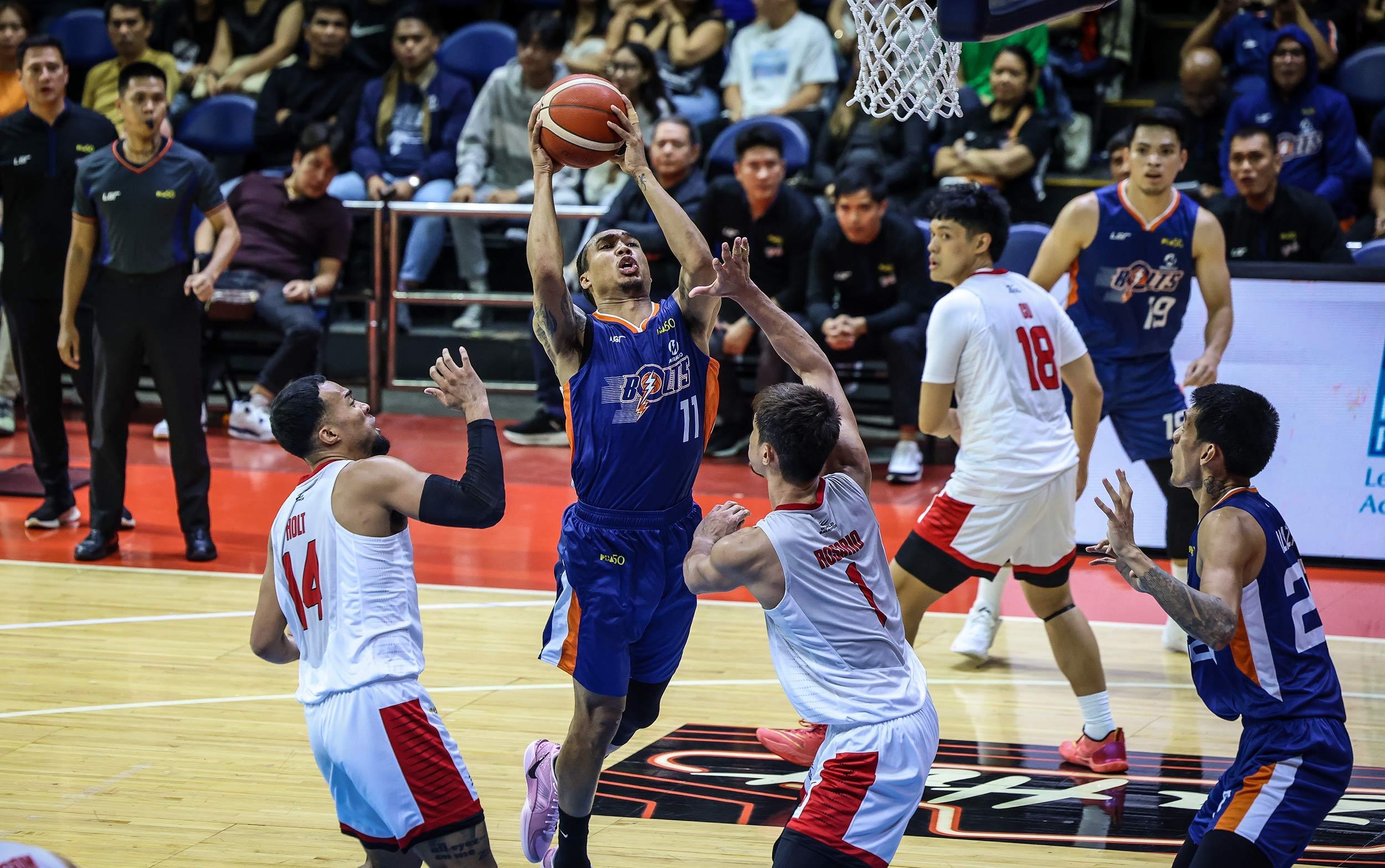 Meralco rallies late past Barangay Ginebra