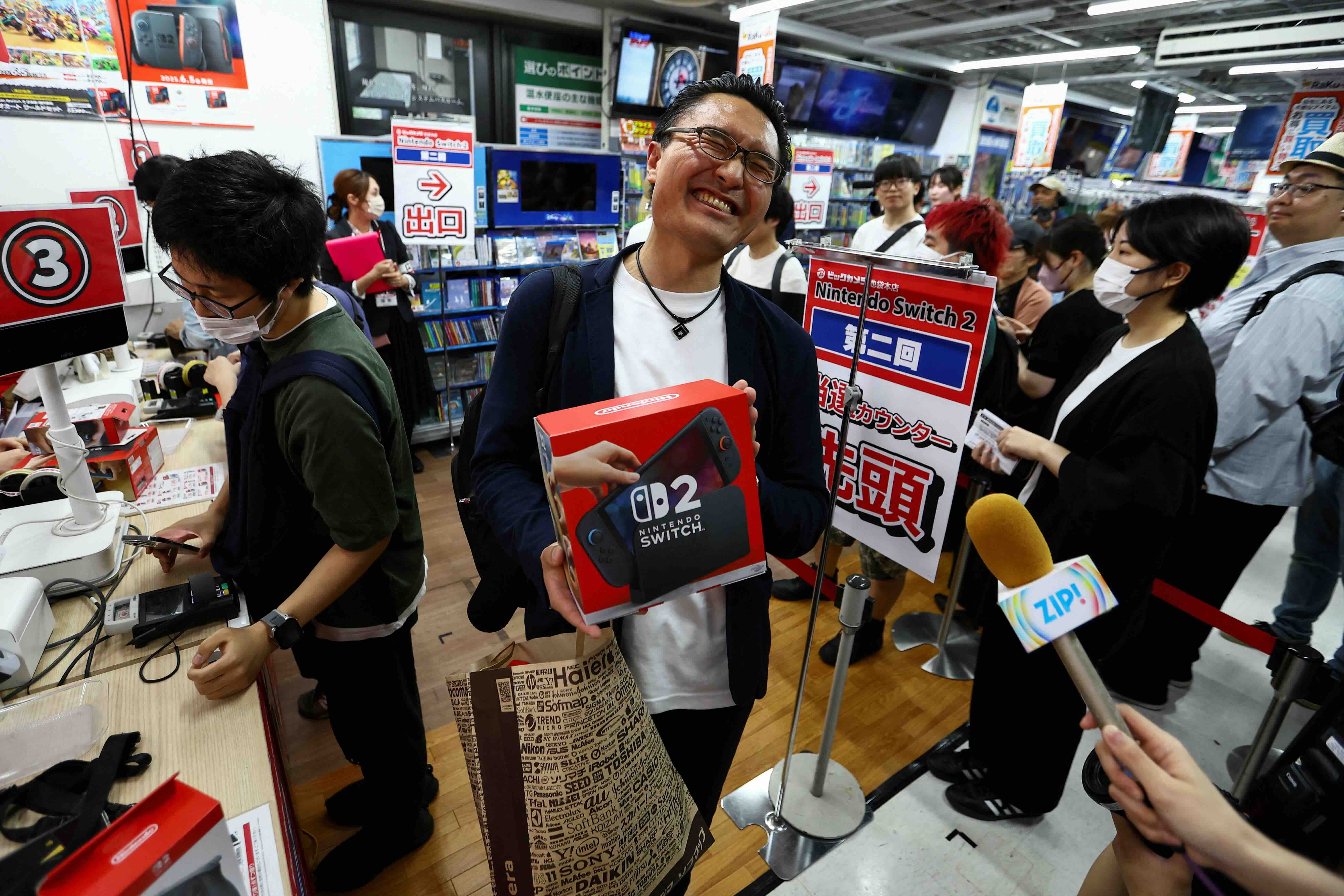 Gamers line up for Nintendo Switch 2 launch