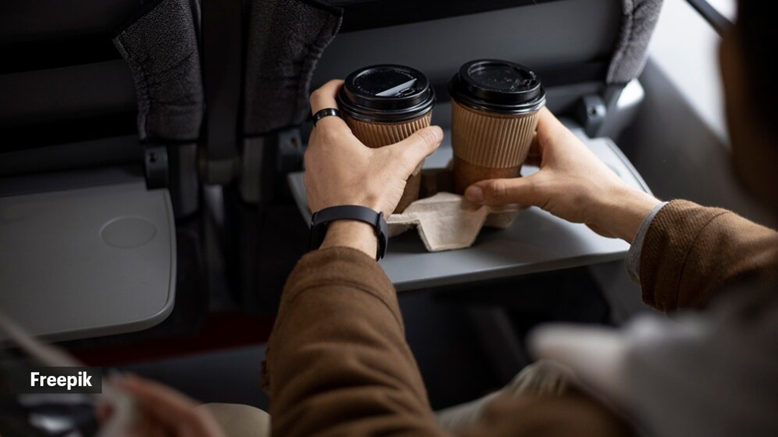 Revealed: The reason tray tables are stowed on flights during takeoff and landing