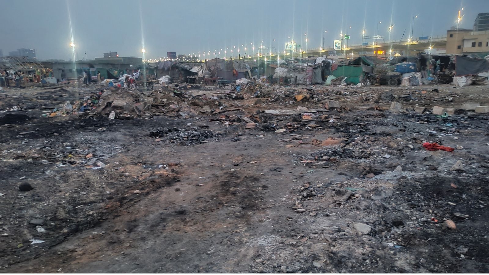 ‘Fire tenders were late…left with nothing': After fire, migrants in Gurgaon slum begin rebuilding homes