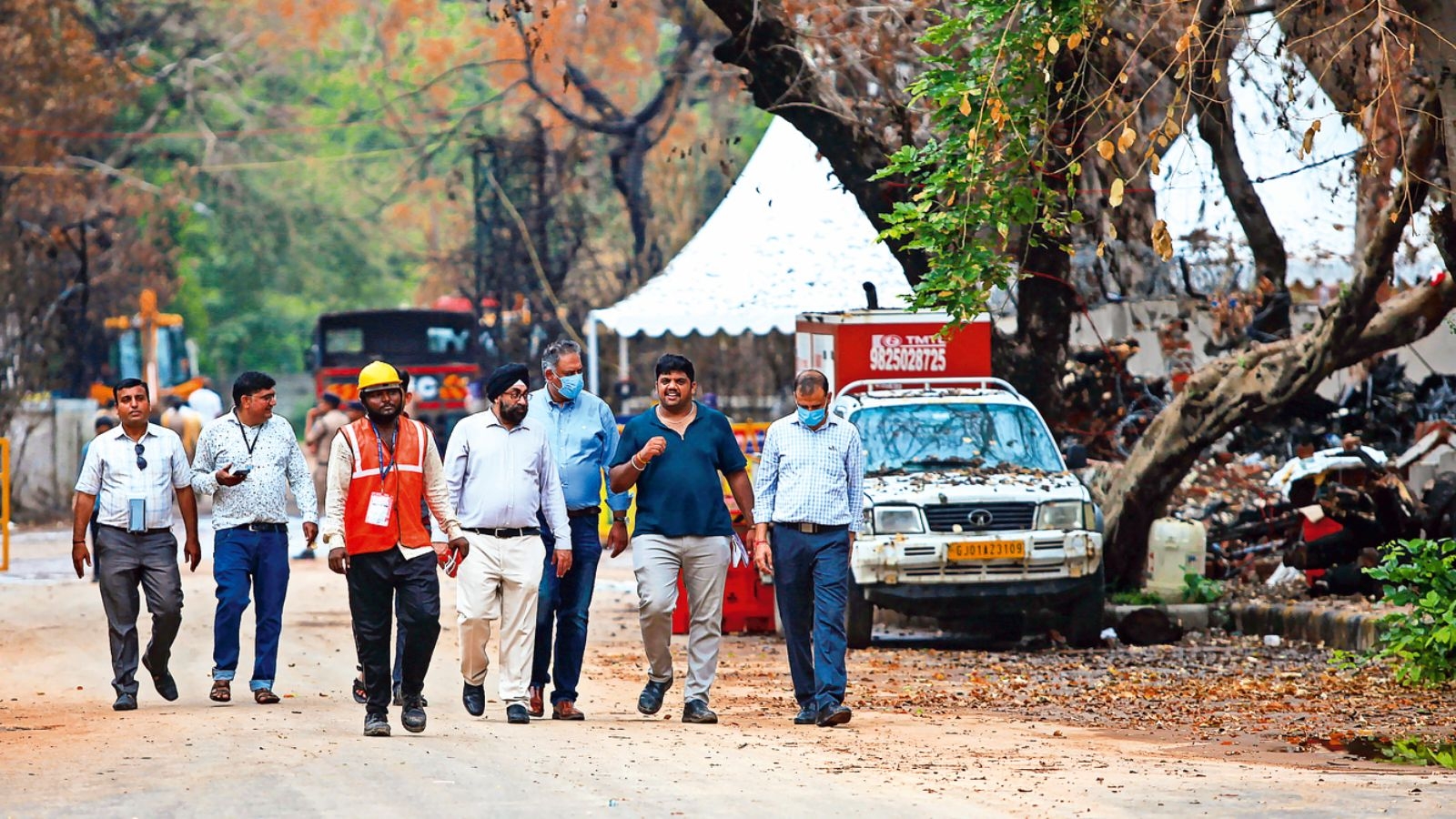 A week later at the Ahmedabad crash site: Unfinished lunch plates, engine still buried under water tank, grieving kin