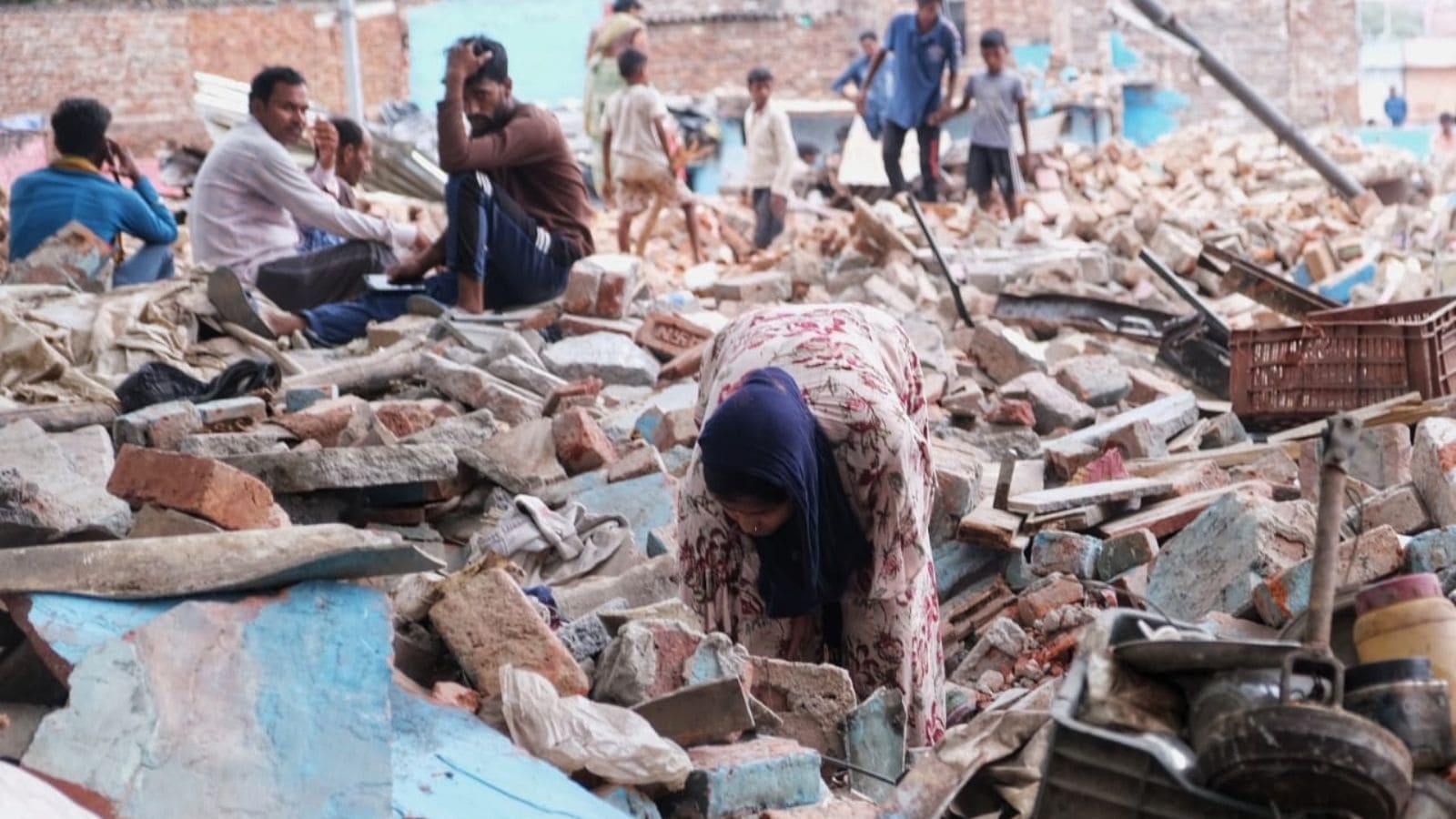 Delhi: Slum dwellers in search of a new home after 300 shanties razed in Ashok Vihar