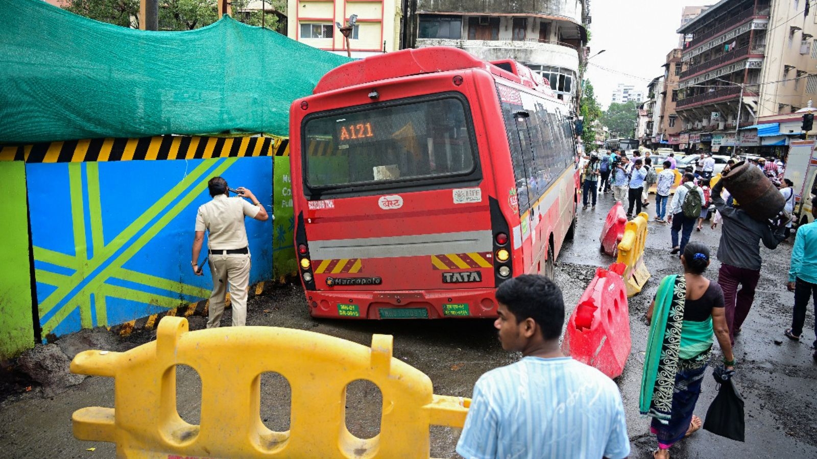 Bus gets stuck in road cave-in near Girgaon Metro site, none injured