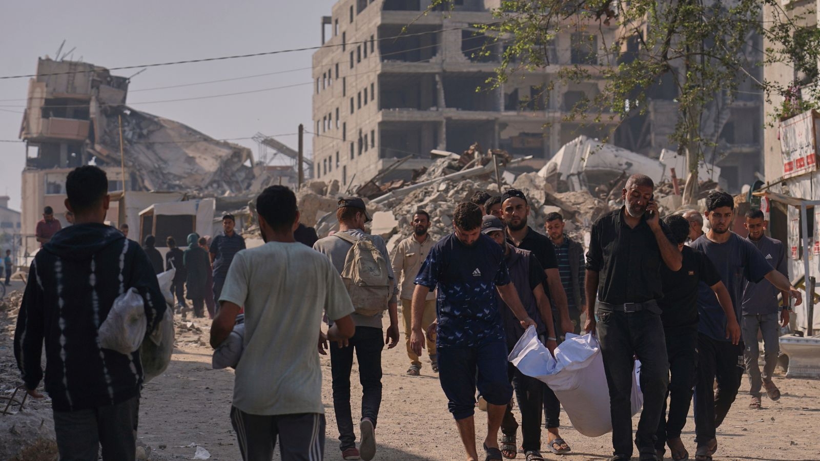 Israeli fire kills 35 in Gaza, many near an aid site, medics say