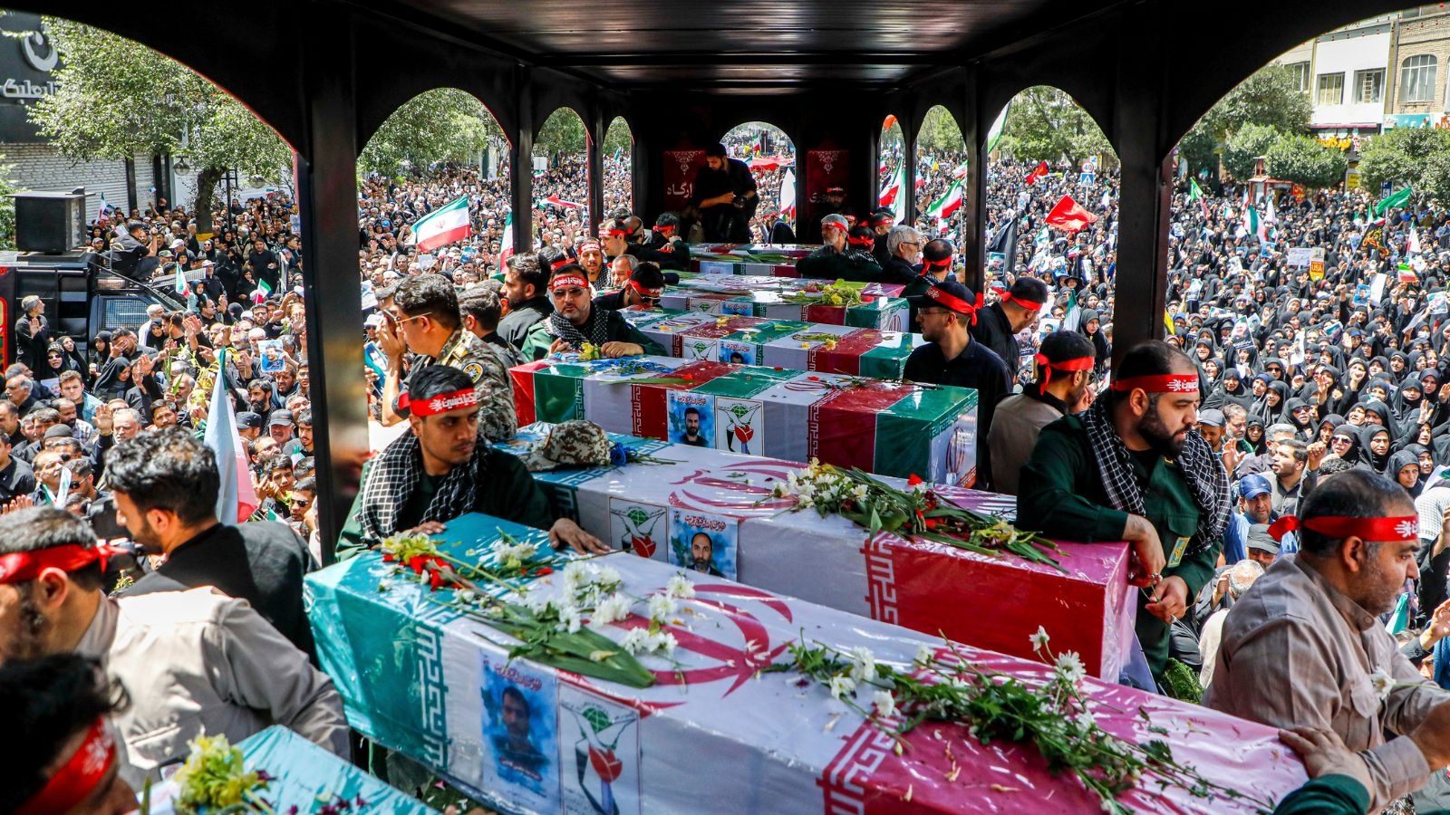 Iran holds mass funeral for top Iranian officials killed in Israel strikes, minister warns Trump against further threats