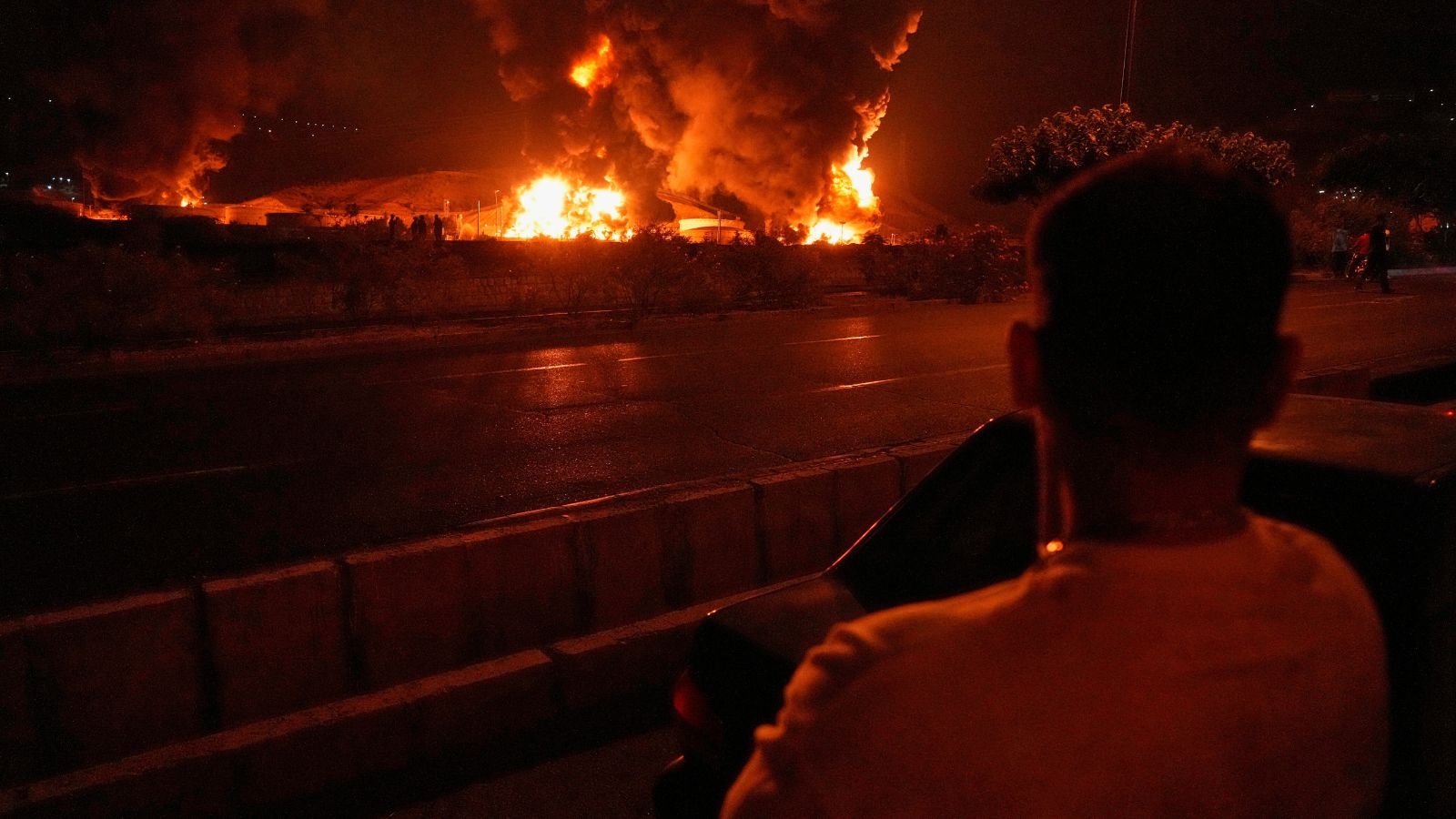 Israeli strikes hit key oil, energy sites in Tehran, triggering fires and panic