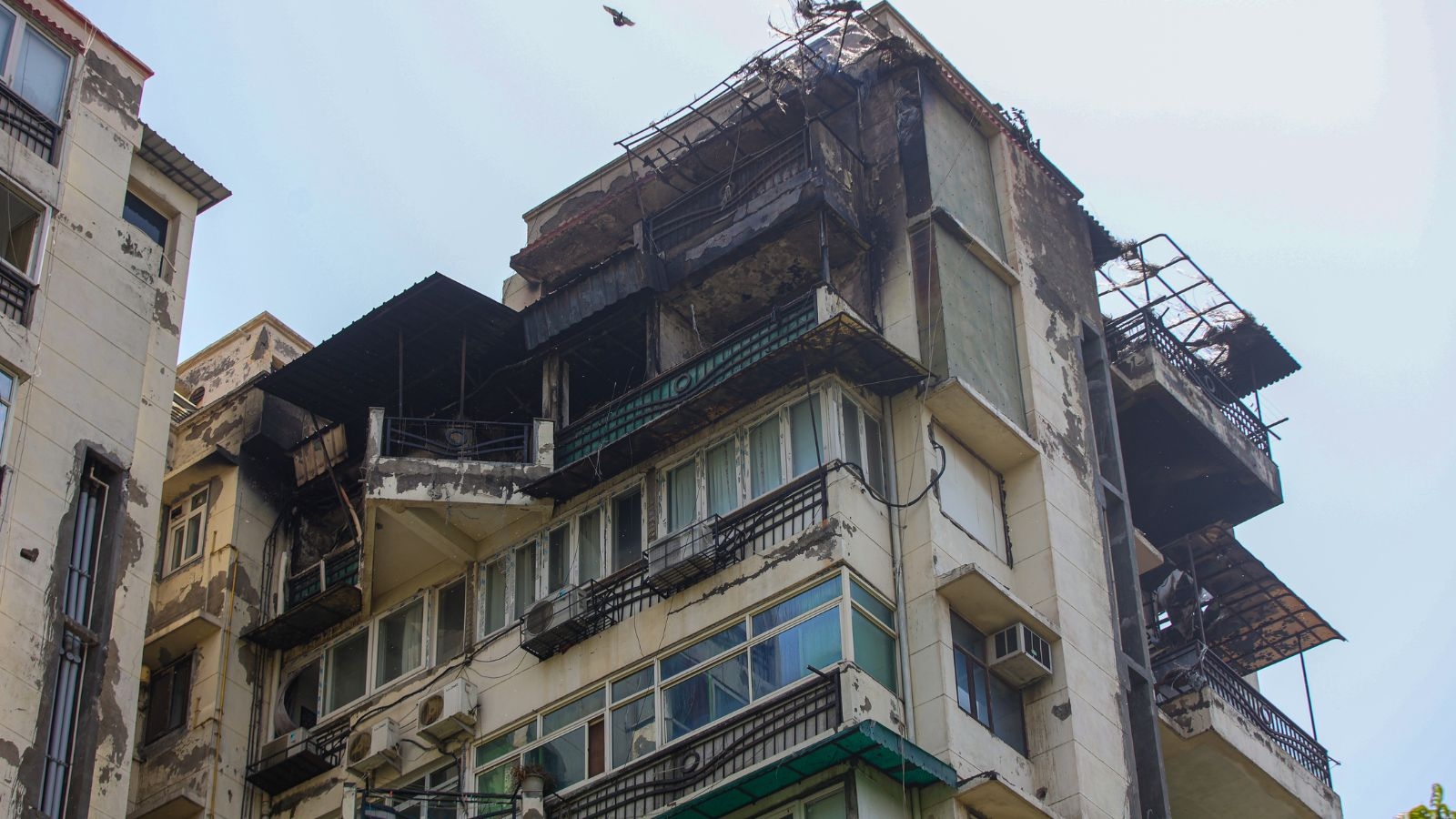 3 fell to death from burning apartment in Dwarka: Electronic lock made getaway difficult, say police