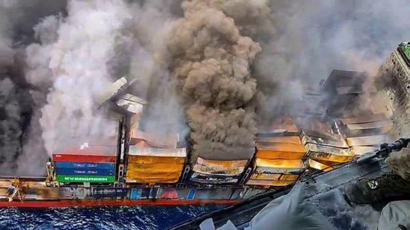 Singapore vessel on fire towed further out to sea as firefighting continues