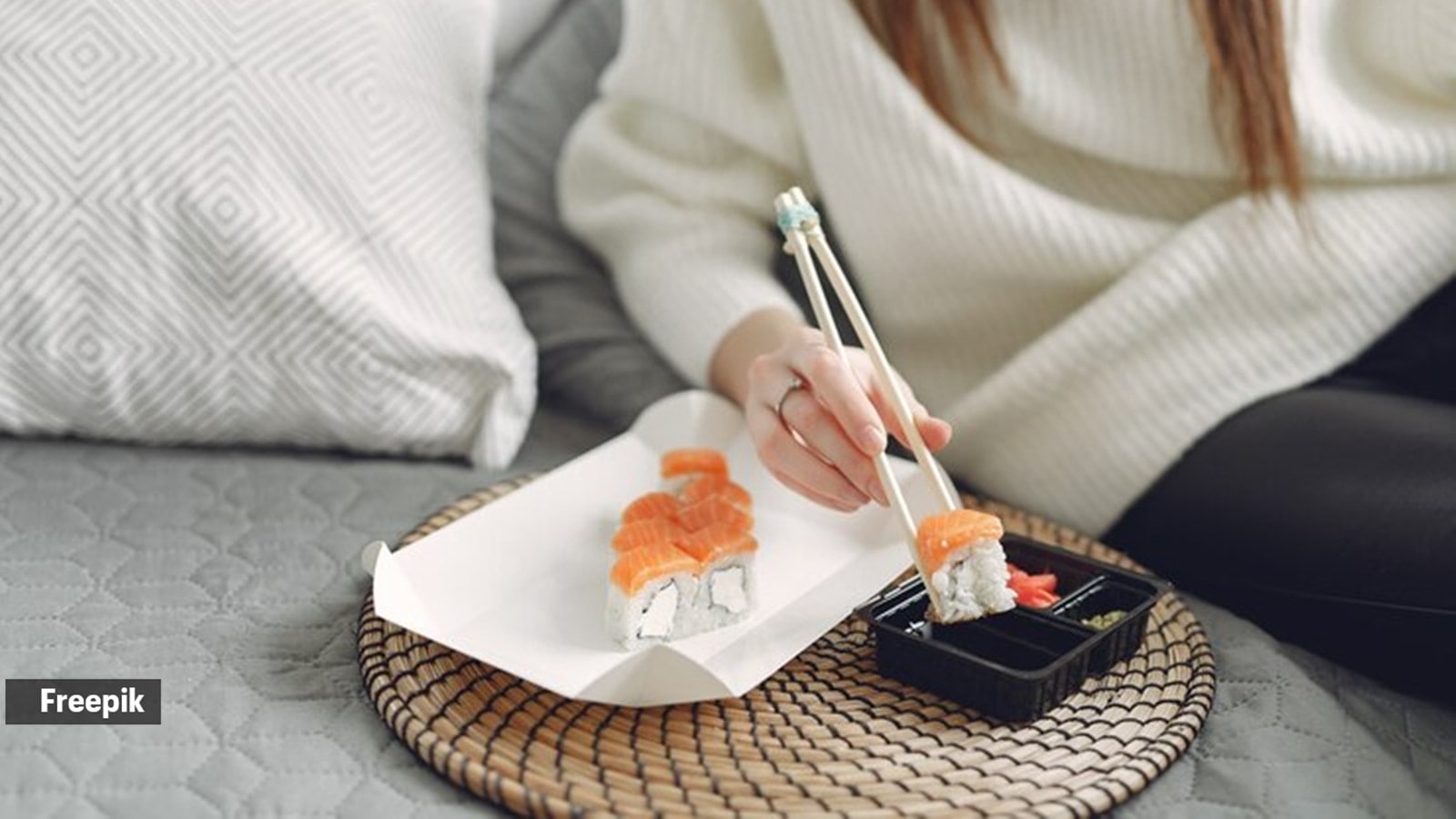 The right way to eat sushi is…