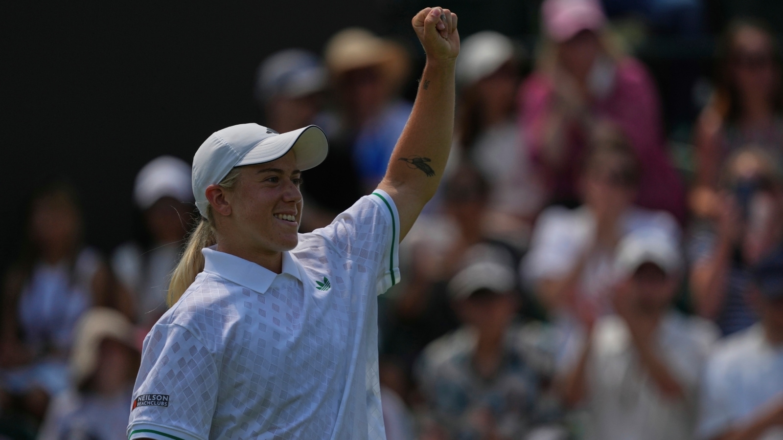 British wildcard Sonay Kartal asks public for ideas for her 15th tattoo at Wimbledon; her favourite currently – pawprint of her Golden Retriever